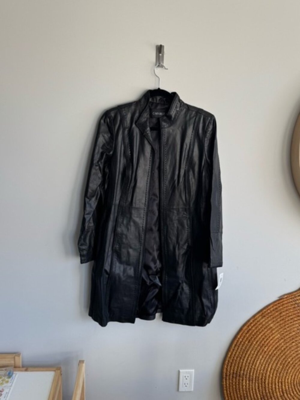 CNVRSTN medium Black Leather Jacket with Long Sleeves and Mid-Thigh Length